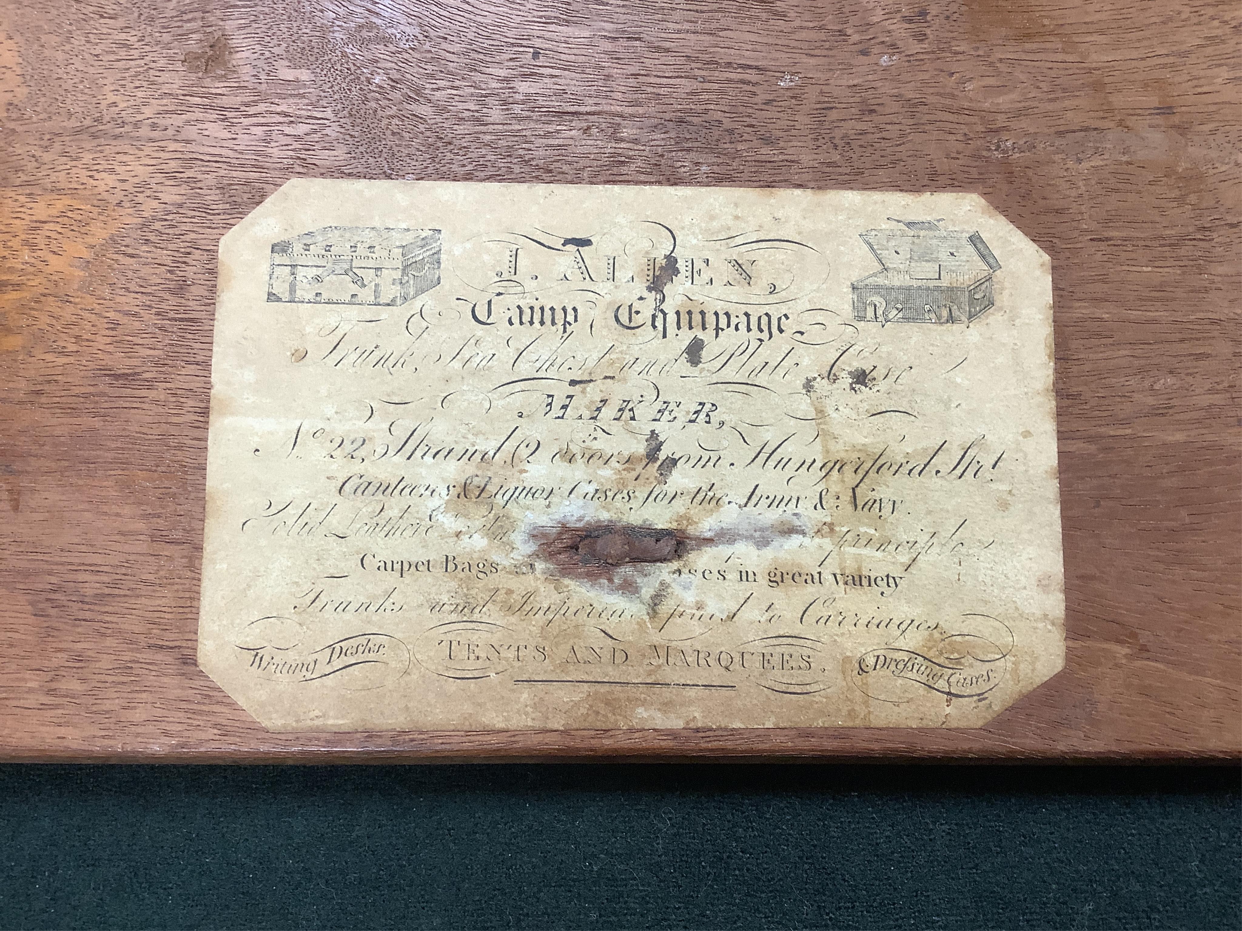An early 19th century brass bound mahogany writing slope with maker's label for J. Allen, 45cm wide